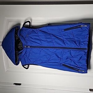 Bench L blue puffer vest with hide away hood